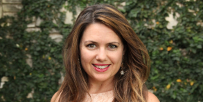 Brunette Woman Smiling at Camera